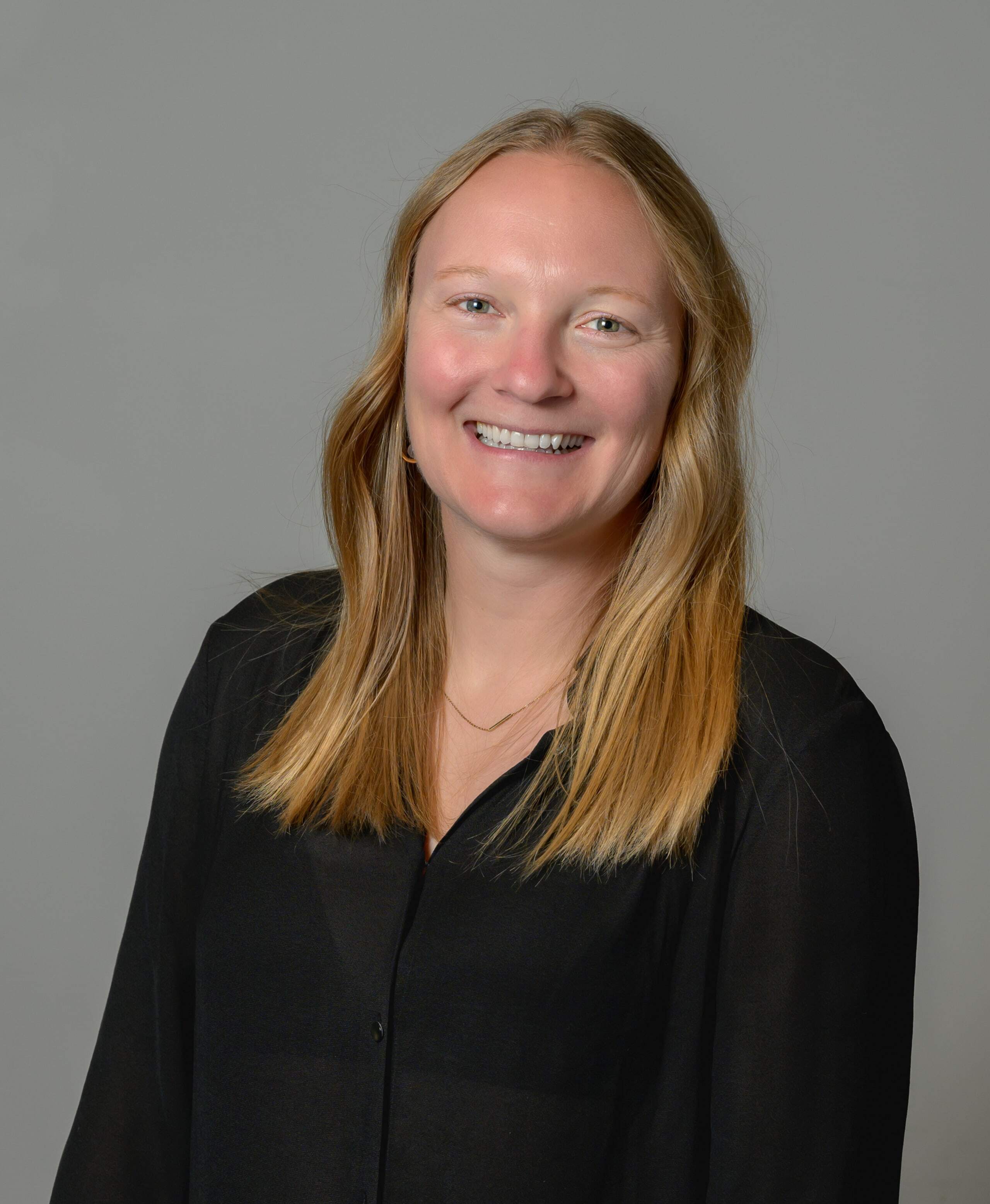Three urllo team members (Jaime Minerson, VP Operations, Matt Hayles, VP Revenue, and Shannon Young, Customer Success Manager) smiling and dressed in cowboy hats and Western attire.