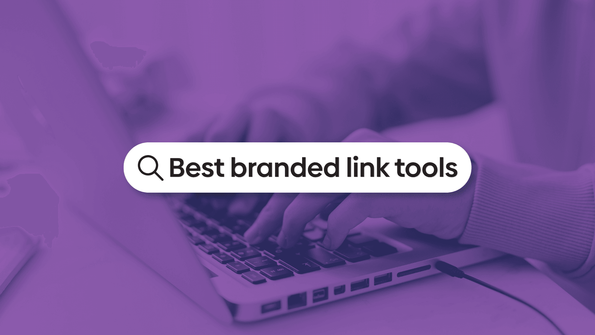 Graphic showing a person on a computer with a search bar reading "Best branded link tools".